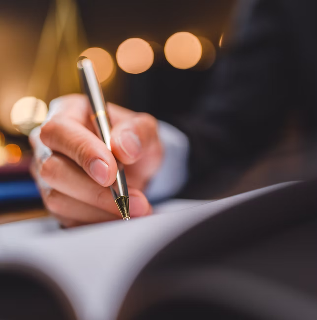 businessman-or-legal-expert-reviewing-document-rep-2023-11-27-05-22-16-utc-1 Employment Law for Employers - Sound Legal Advice.