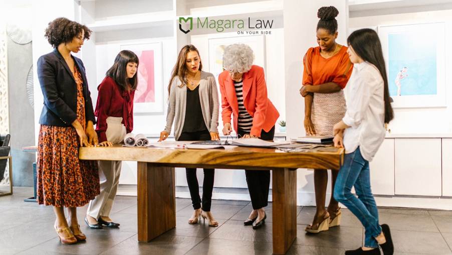 Women discussing a menopause policy for their place of work.