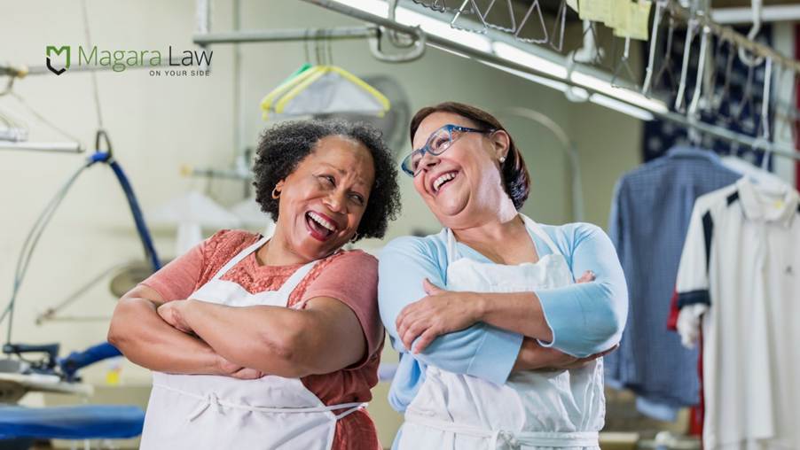 Two older women in the workplace sharing their mental health journeys.