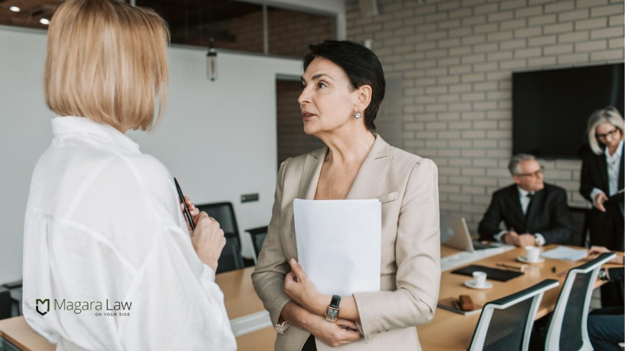 A female senior manager facing workplace bullying.