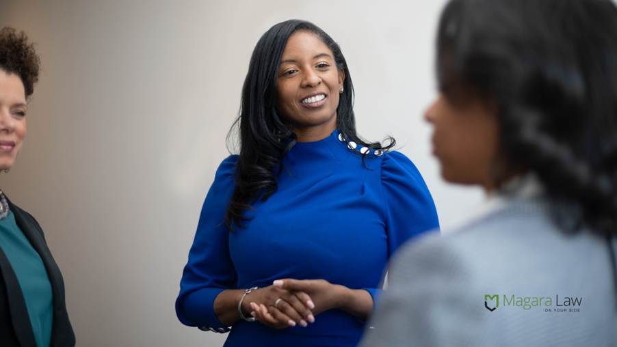 Women discussing perimenopause as an employment law issue.