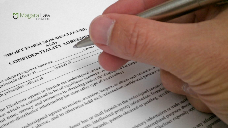 An employee signing a non-disclosure agreement amid workplace bullying.