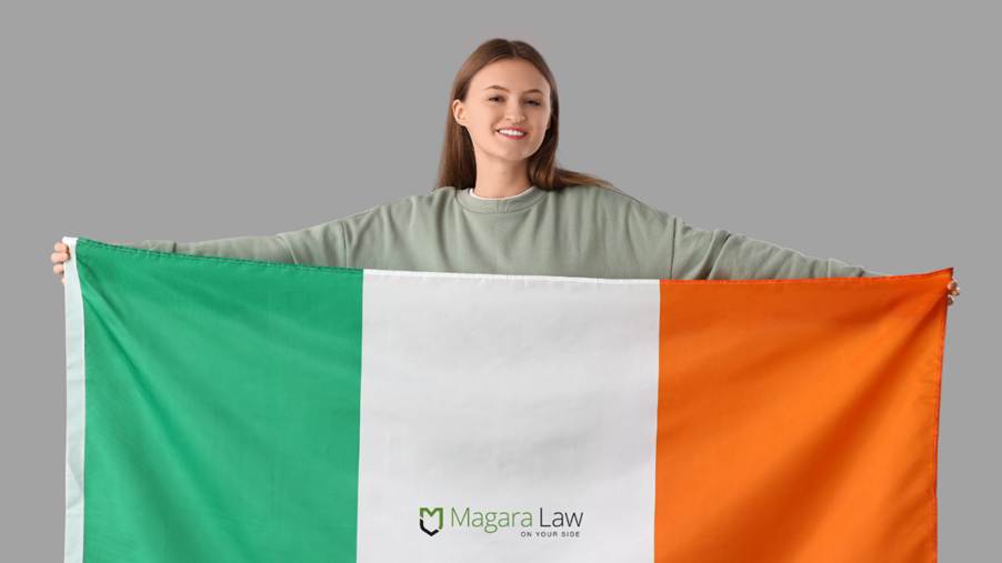 A woman holding an Irish flag in light of the recent "potato" employment tribunal.