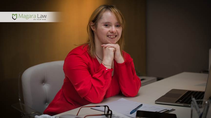 Reasonable adjustments made in a home office for a lady with downs syndrome.