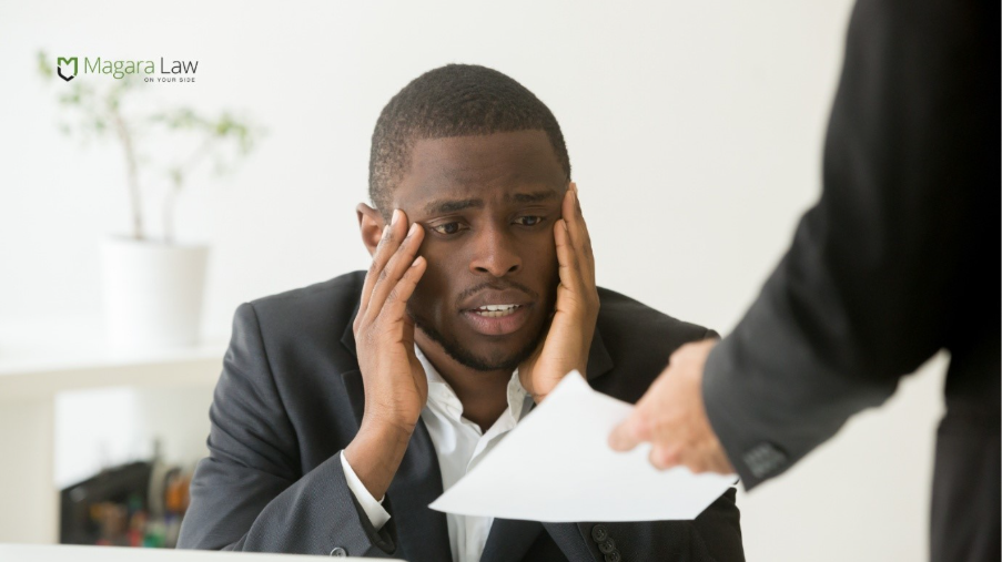 A man subjected to an unfair dismissal in the workplace.