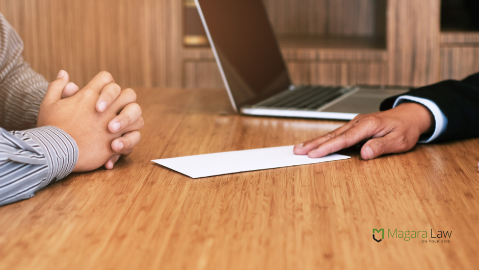 A JLR employee receives a settlement agreement / redundancy package.